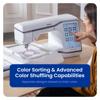 Woman selecting embroidery designs on Brother Stellaire sewing machine touchscreen