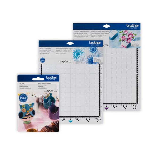 Brother ScanNCut DX essential accessories bundle with cutting mats, auto blade, and measuring grid