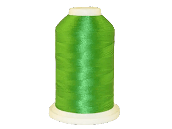 Brother bright green embroidery thread spool on white background