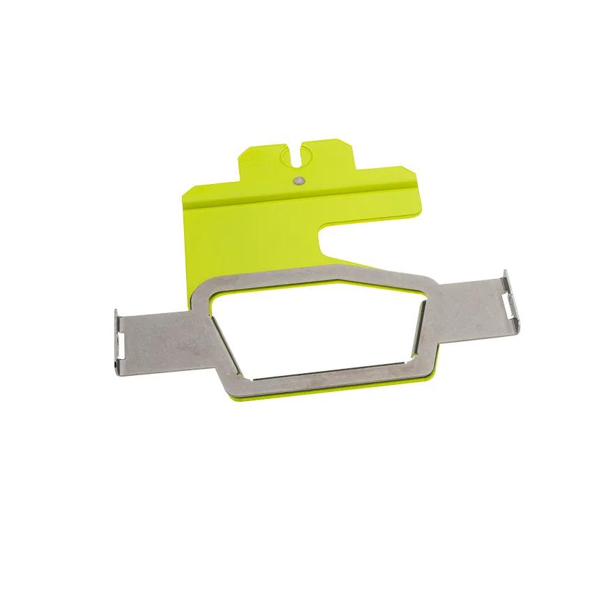 Brother embroidery hoop frame with yellow border and metal clips for fabric securing