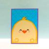 Quilted fabric panel with embroidered yellow chick character design and purple border