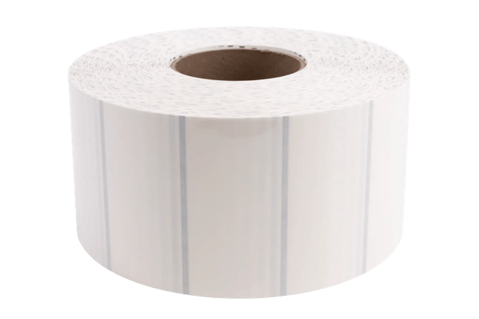 Brother white die-cut label roll on cardboard core with perforated edges