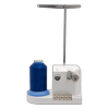 Brother bobbin winder with blue thread spool and tension arm