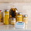 Brother label maker on kitchen counter with pasta storage jars