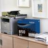 Brother all-in-one laser printer with TN850 toner cartridge 2-pack on office desk