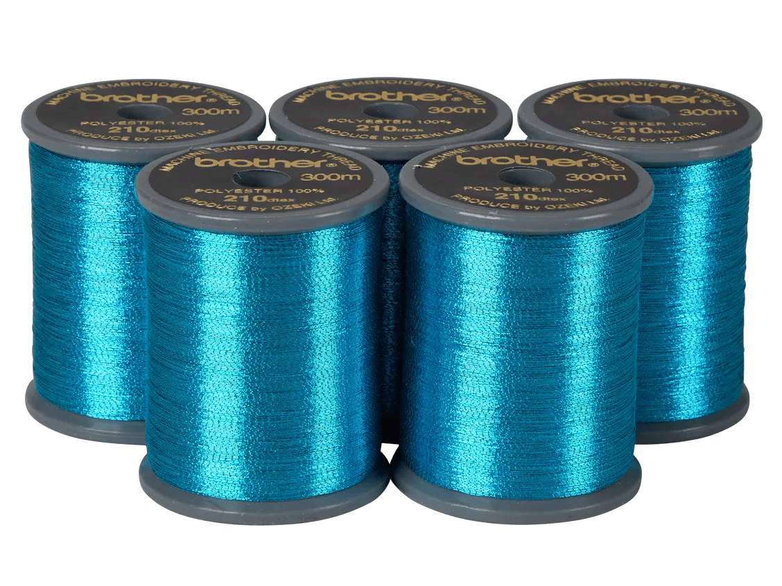 Brother polyester embroidery thread spools in metallic teal, 300m