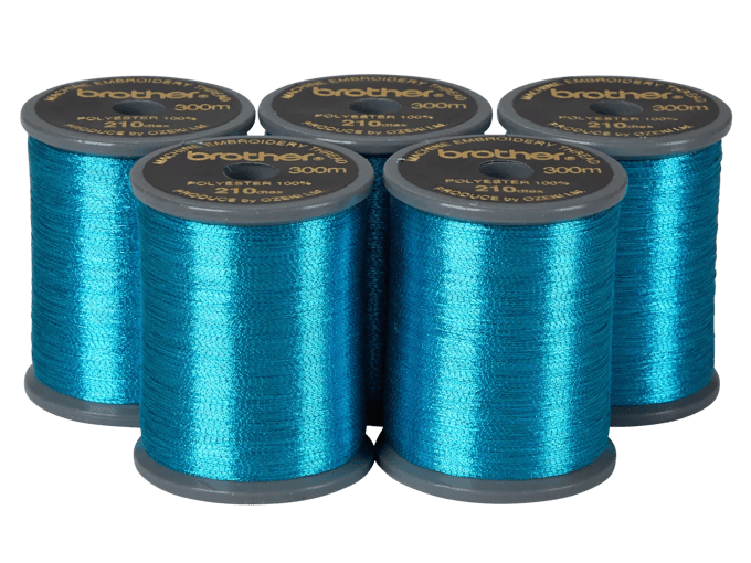 Brother polyester embroidery thread spools in metallic teal, 300m