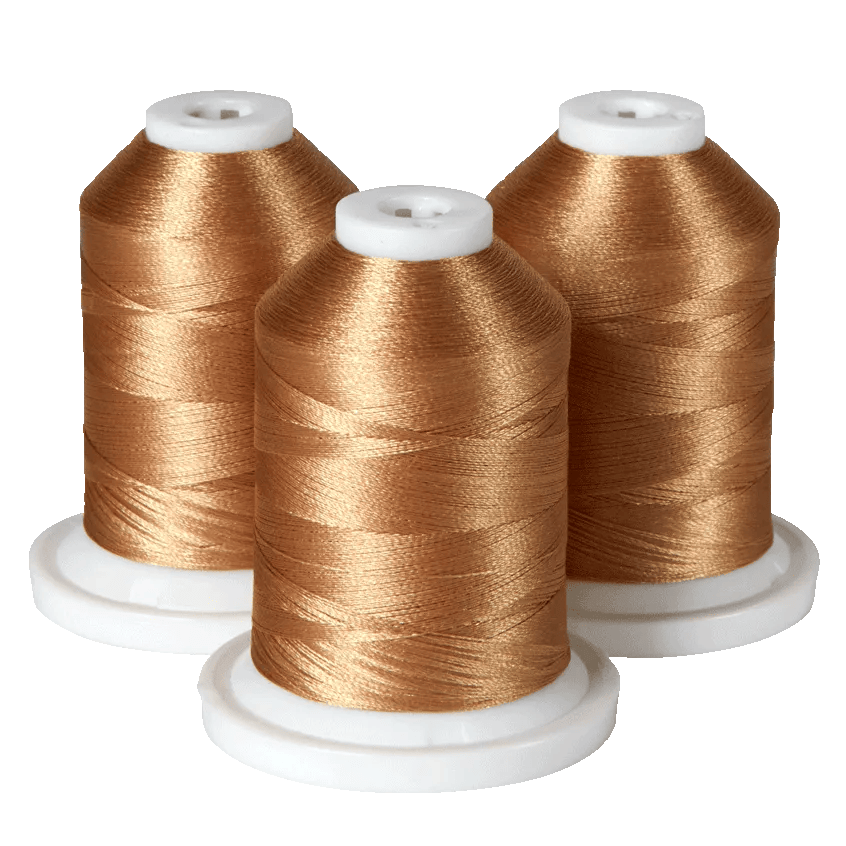 Three spools of gold embroidery thread on white bases for Brother sewing machines