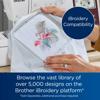 Brother embroidery machine with flamingo design in hoop showing iBroidery compatibility