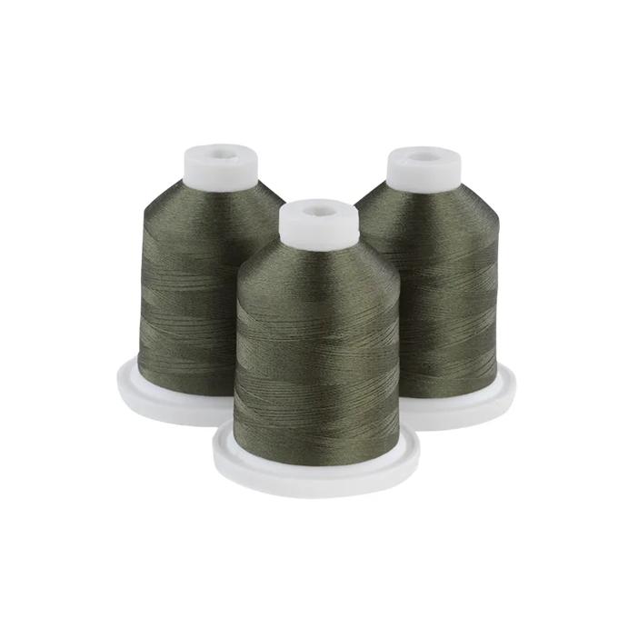 Three dark army green embroidery thread spools on white bases