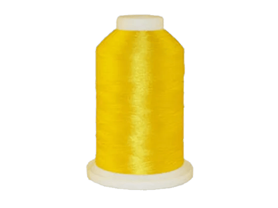 Brother yellow embroidery thread spool with white cap on cone base