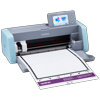 Brother SDX125 electronic cutting machine with touchscreen display and material loaded