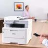 Brother color laser all-in-one printer on office desk with mobile printing feature
