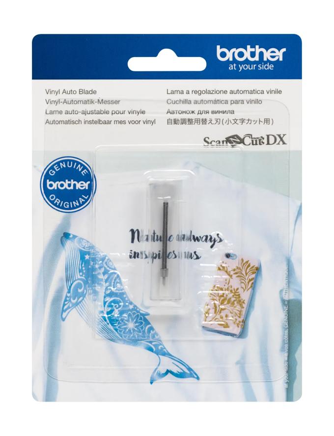 Brother ScanNCut DX vinyl auto blade in package with decorative bird and leaf samples
