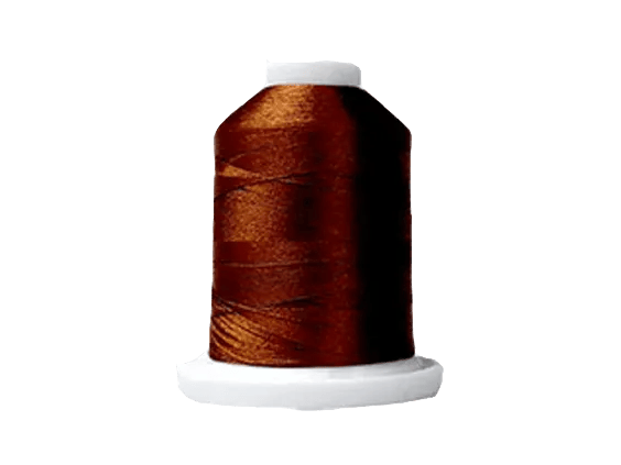 Brother embroidery thread spool in copper brown on white cone