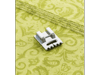 Brother sewing machine pintuck foot on yellow decorative fabric with stitched detail