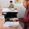 Man replacing toner cartridge in Brother MFC-L5710DN monochrome laser all-in-one printer