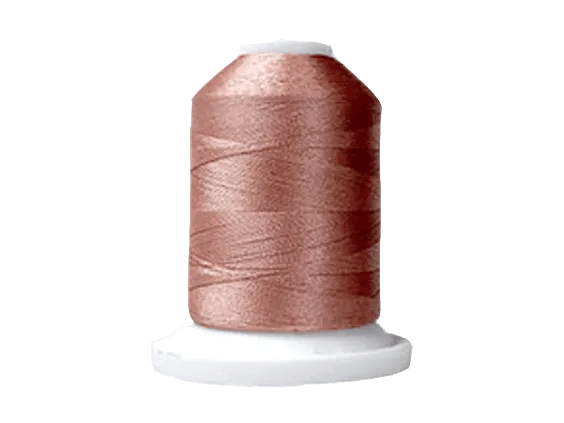 Brother embroidery thread spool in rose gold on white cone