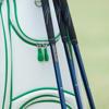 Brother TZe label tape in gold on black with green cable ties on white and green background