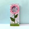 Brother ScanNCut flower-shaped gift box with clear window displaying paper cutouts