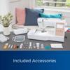 Brother sewing machine with touchscreen and included accessories on gray table