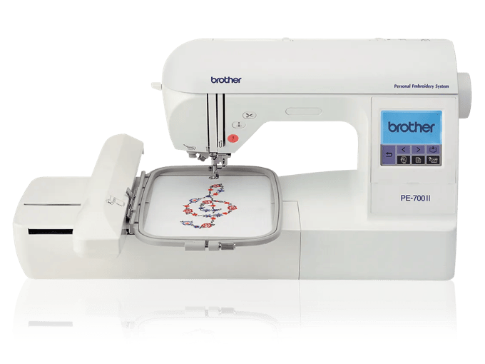 Brother PE-700II embroidery machine with touchscreen and floral design in hoop