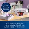 Brother sublimation printer printing vibrant custom designs on t-shirts in home workspace