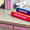 Brother label maker organizing office binders and file drawer with color-coded labels