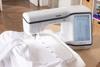 Brother Celeste sewing and embroidery machine with touchscreen stitching white table runner