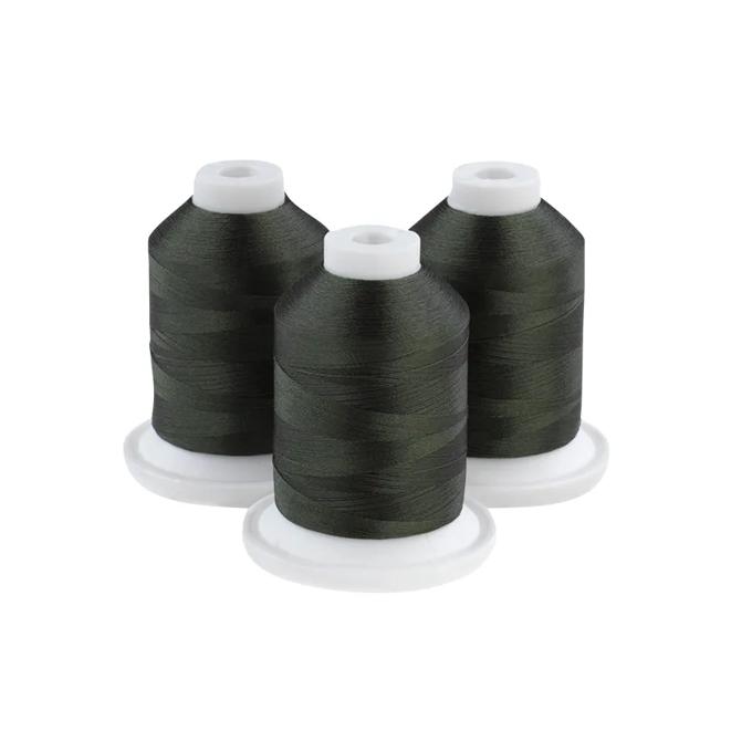 Three spools of olive drab embroidery thread on white bases