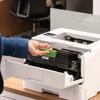 Brother HL-L5215DW monochrome laser printer with toner cartridge being installed