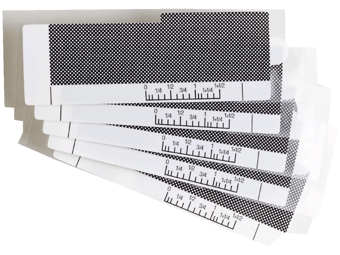 Brother ScanNCut adhesive cutting mat with measurement ruler markings in inches