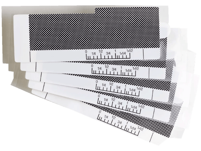 Brother ScanNCut adhesive cutting mat with measurement ruler markings in inches