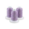 Three spools of mild purple embroidery thread on white bases