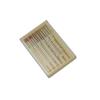 Brother embroidery machine needles in wooden case with assorted sizes