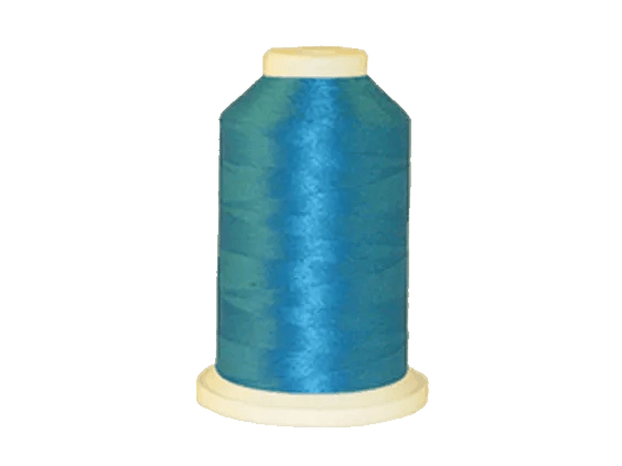 Brother embroidery thread spool in turquoise blue on white background