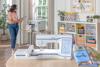 Brother Celeste embroidery machine with touchscreen in bright home craft room