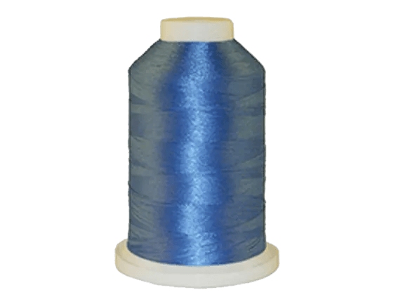 Brother blue embroidery thread spool on white background