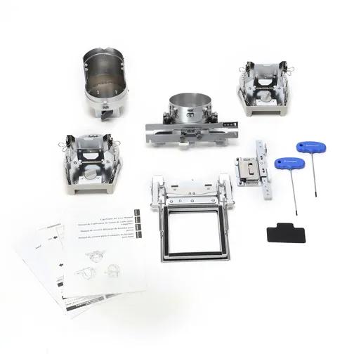 Brother press platen kit with multiple frames, tools, and instruction manual on white background