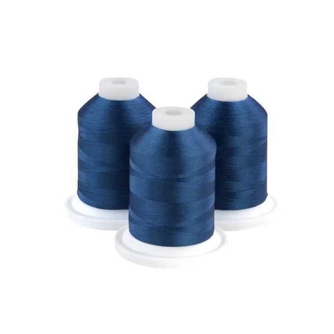 Three blue embroidery thread spools on white bases for sewing and crafting projects