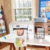 Brother PrintModa wireless fabric printer creating custom photo quilts in home craft room