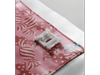 Brother sewing machine presser foot on pink patterned fabric with decorative stitching