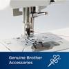 Brother sewing machine presser foot with red thread on needle plate
