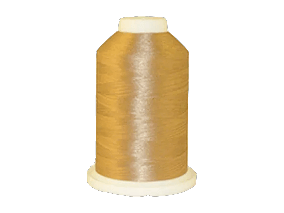 Brother embroidery thread spool in gold polyester on white background