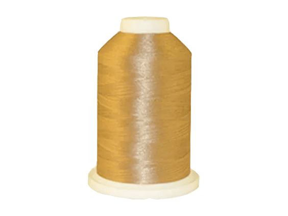 Brother embroidery thread spool in gold polyester on white background