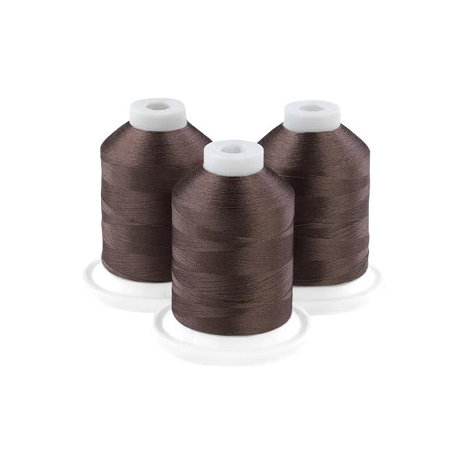 Three spools of old sage embroidery thread on white bases