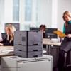 Brother HL-L5100DN monochrome laser printer with LT5500 paper tray tower in office setting