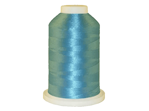 Brother embroidery thread spool in light blue with beige cap on white background